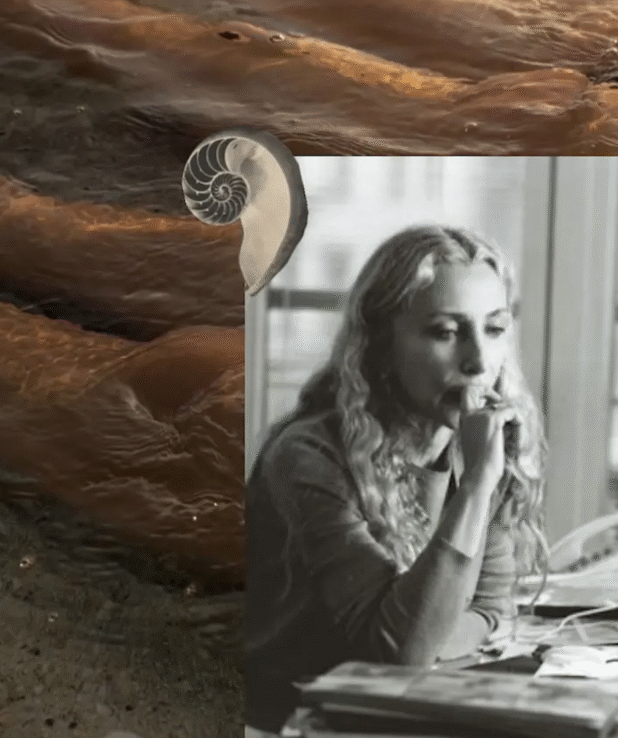 Kvinna som sitter och funderar med allvarlig uppsyn.